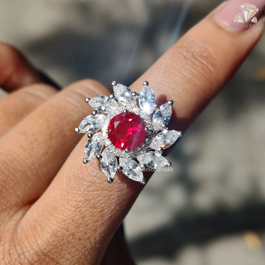 Elevate your style with our stunning Ruby Moissanite Halo Ring. The round cut and halo design create a dazzling look, making it an ideal choice for those who love unique jewelry!

