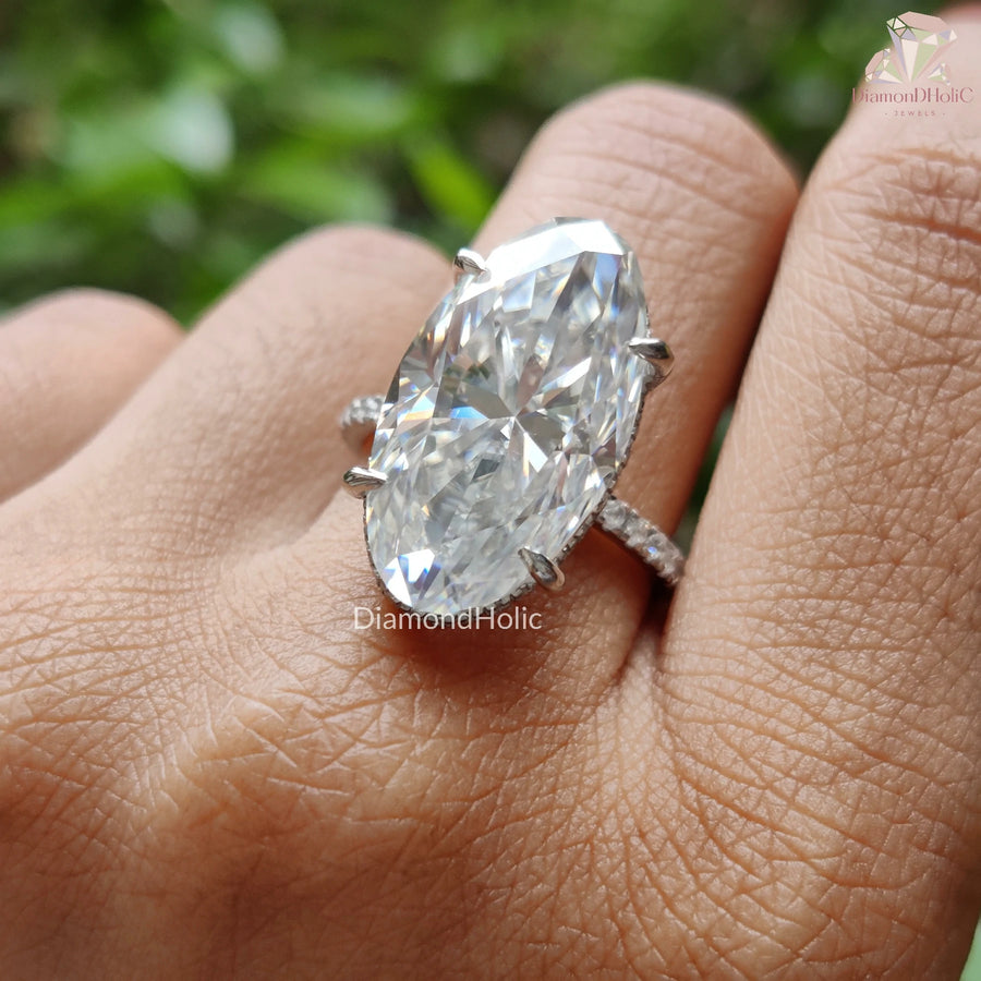 Elegant Four Prong Moissanite Ring
