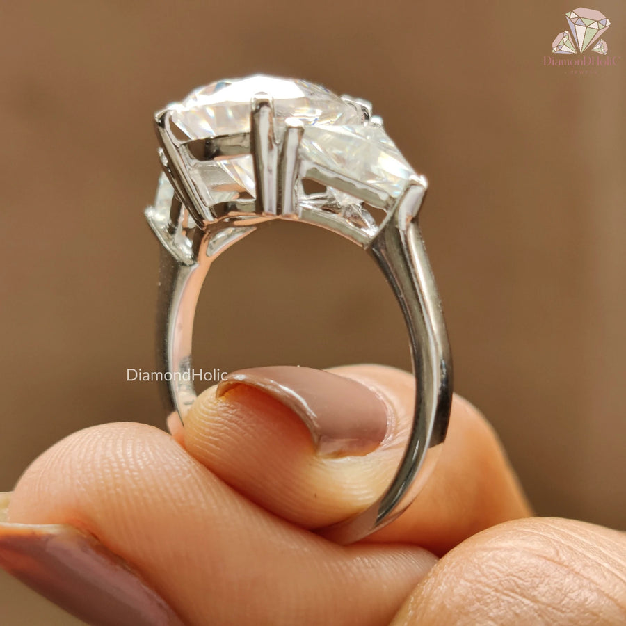 sparkling three stone engagement ring,