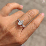 Three-Stone Pear Cut Moissanite Engagement Ring with Tapper Side Stones