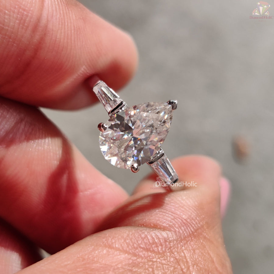 Three-Stone Pear Cut Moissanite Engagement Ring with Tapper Side Stones