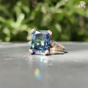 Timeless Three Stone Moissanite Ring | Royal Blue Elegance
